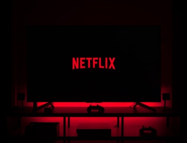 flat screen television displaying Netflix logo
